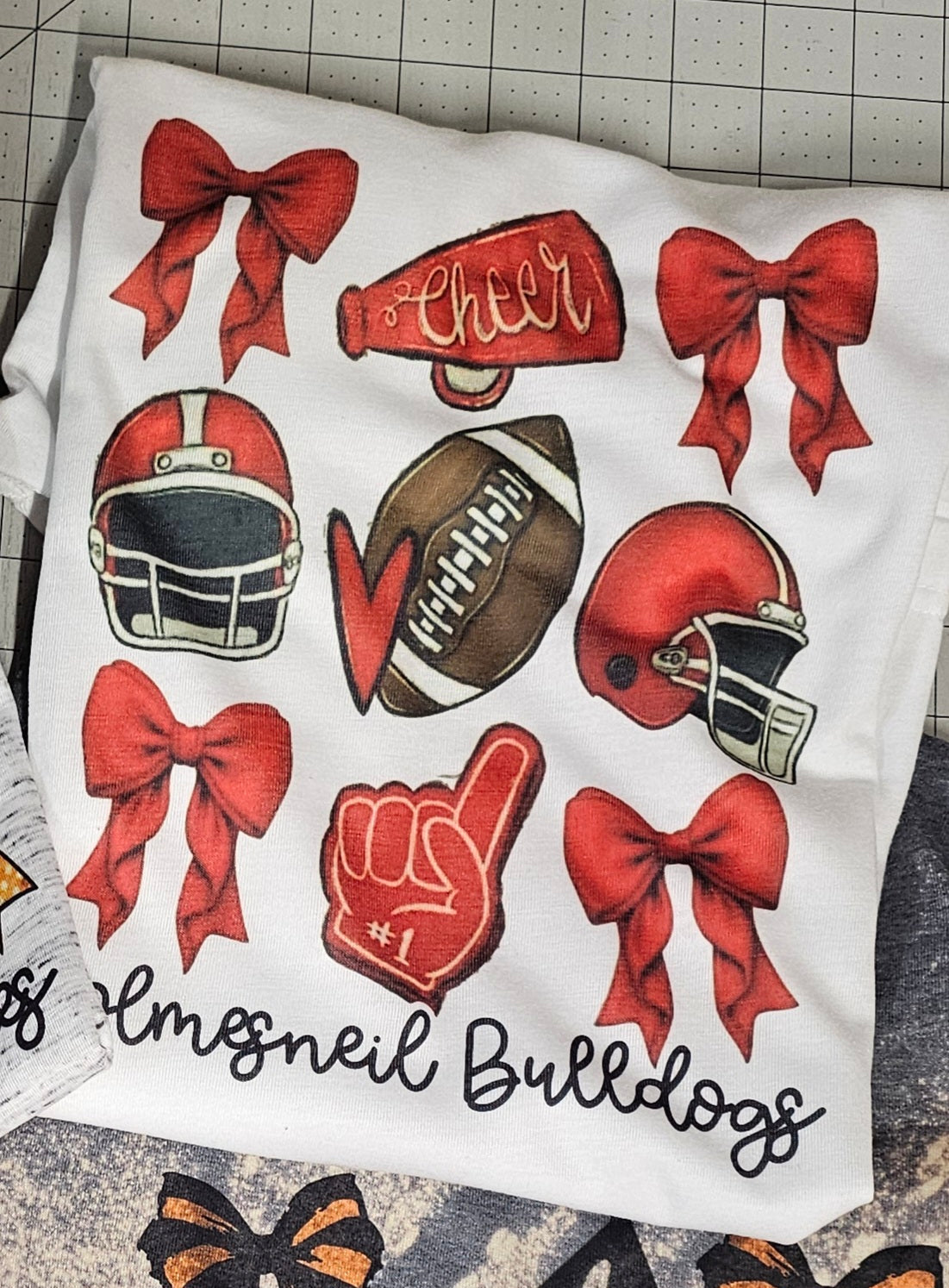 Bow and football shirt